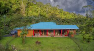 Single‑level 3,800‑square‑foot home on the Lucky Bug Property in Costa Rica, surrounded by tropical forest and lush greenery."